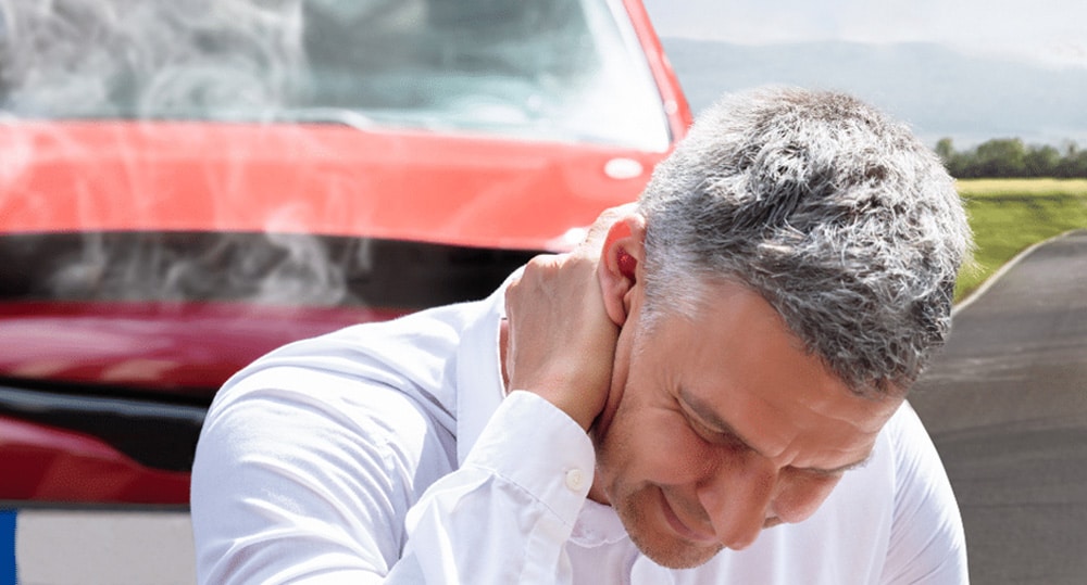Chiropractor treating a neck injury after a collision at our Milwaukie clinic