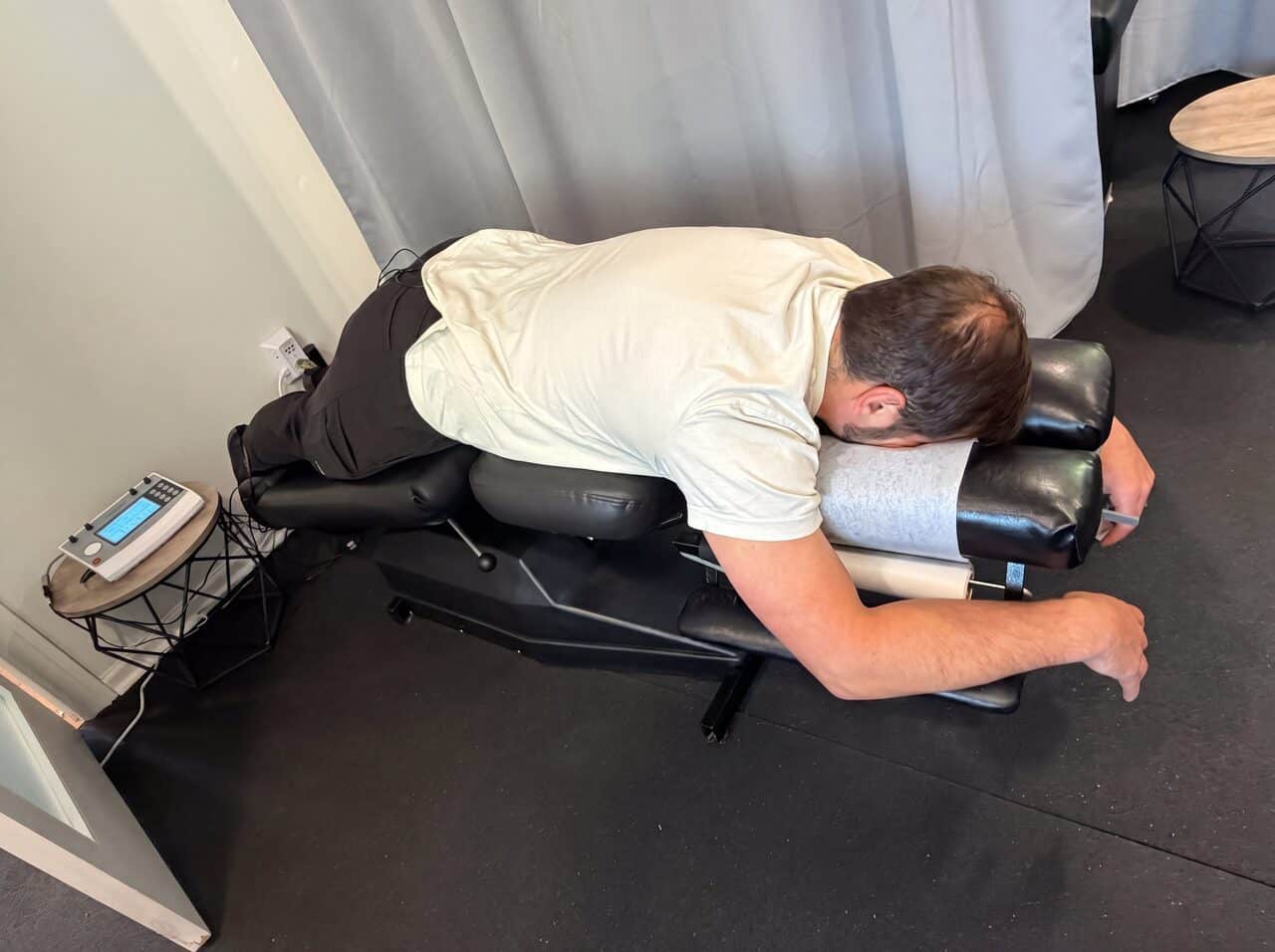 E-stim and soft-tissue therapy easing post-accident headaches and neck tension at Auto Injury Chiropractic, Troutdale OR