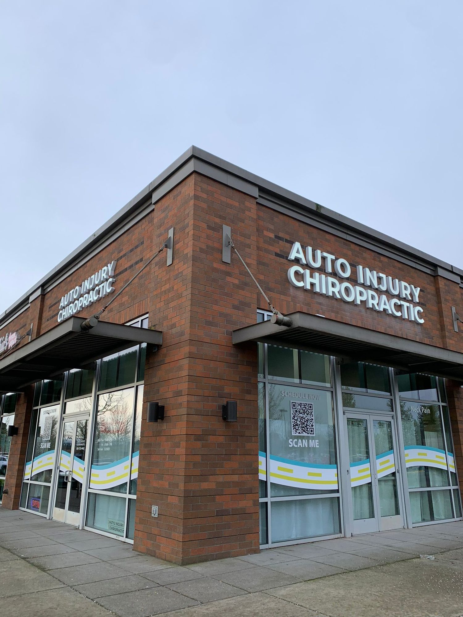 Auto Injury Chiropractic storefront and sign at 1404 Molalla Ave, Oregon City