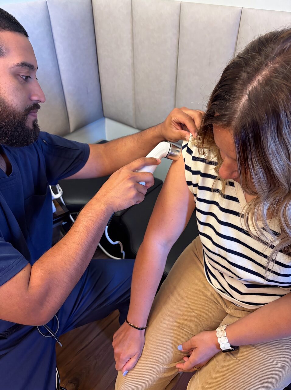 Chiropractor performing a gentle neck adjustment for whiplash at our Oregon City clinic