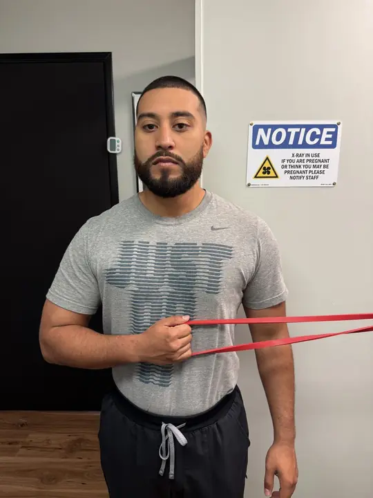 Band External Rotation: Start: elbow tucked, hand across the belly