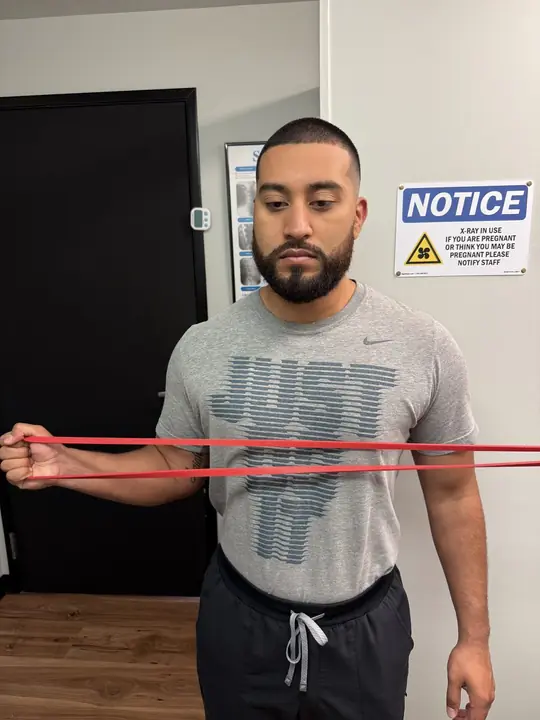Band External Rotation: Rotate: forearm turns out, elbow stays tucked