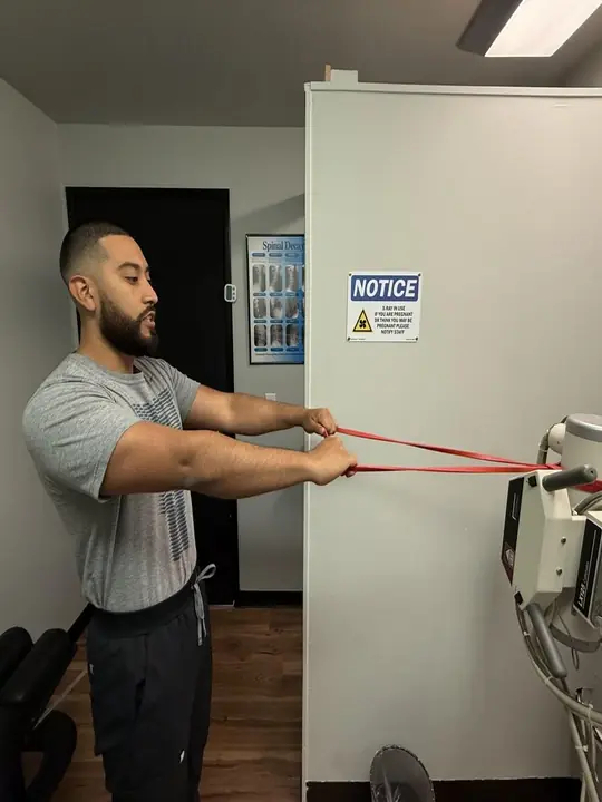 Band Rows: Start: arms straight, band at chest height