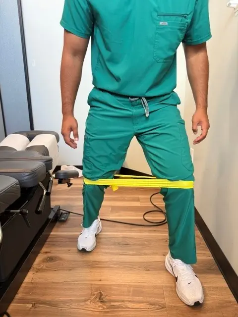 Banded Lateral Walk: Step sideways, knees stay pressed out