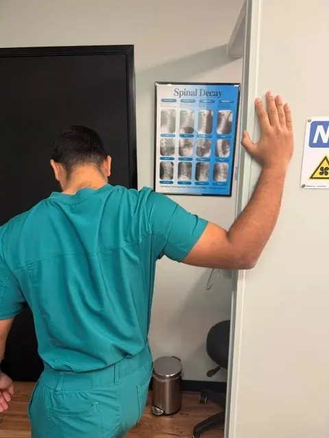 Doorway Pec Stretch: Gentle stretch across the front of the shoulder
