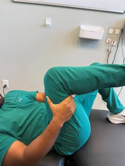 Lying Knee Circles: Hold under the thigh and make slow, gentle circles