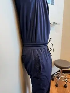 Pelvic Tilts: Flatten: low back flattens into the wall