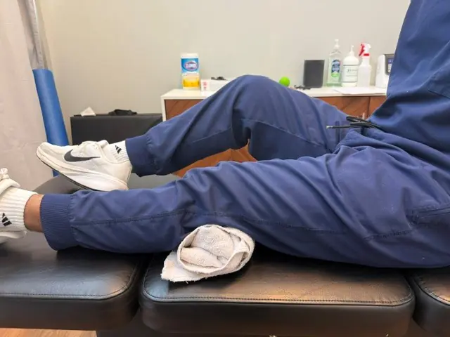 Quad Sets: Towel under the knee, thigh muscle tightened