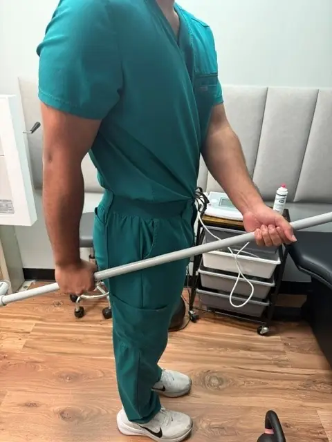 Shoulder Range of Motion with a Dowel: Dowel range of motion, position 1