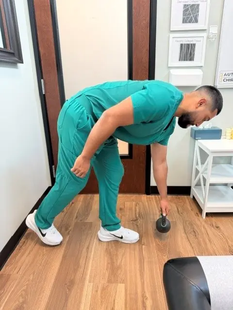Single-Leg Deadlift: Hinging forward, weight reaching toward the floor