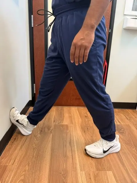 Wall Calf Stretch: Back leg straight